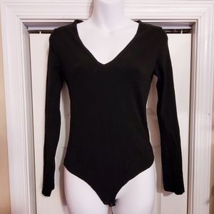 Solid black bodysuit